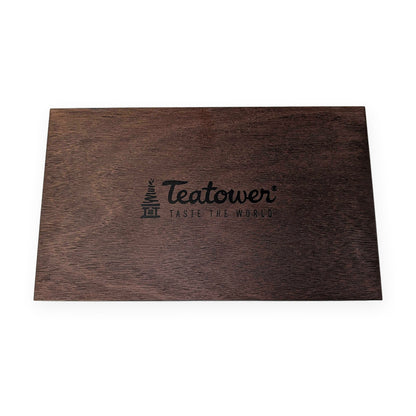 Couvercle du coffret en bois Teatower gravé du logo Taste the World